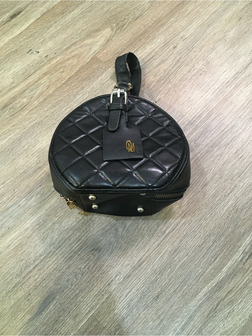 Black Quilted Round Crossbody Bag by